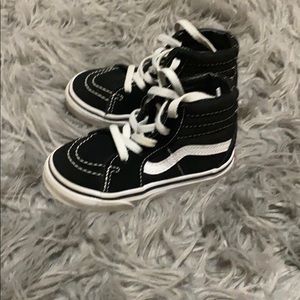 White and black high top vans